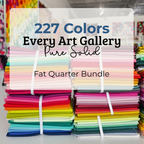 Multicolor fat quarter fabric bundle, folded stacks tied with white straps