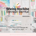 White JUKI sewing machine with needle and control panel on a tabletop