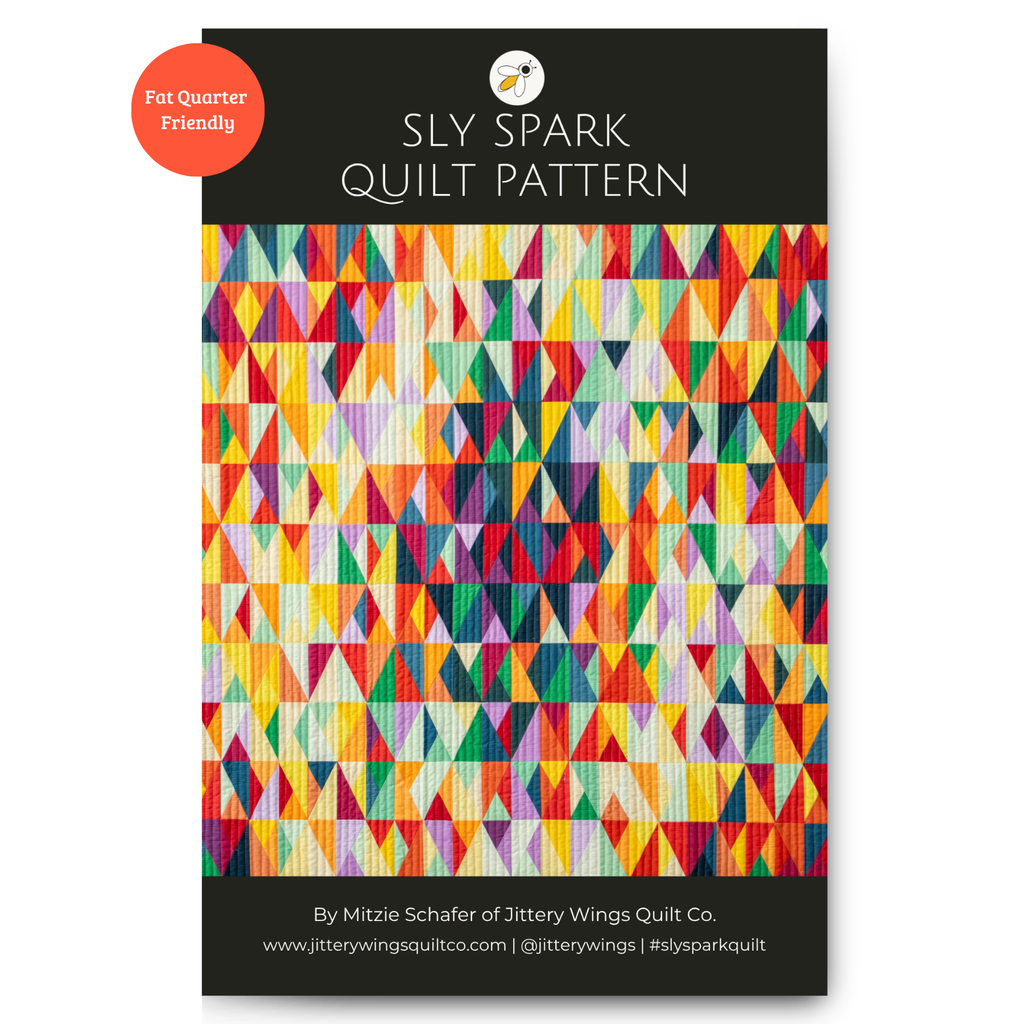 Quilt pattern PDF front cover with multicolor geometric triangle quilt design