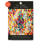 Quilt pattern PDF front cover with multicolor geometric triangle quilt design